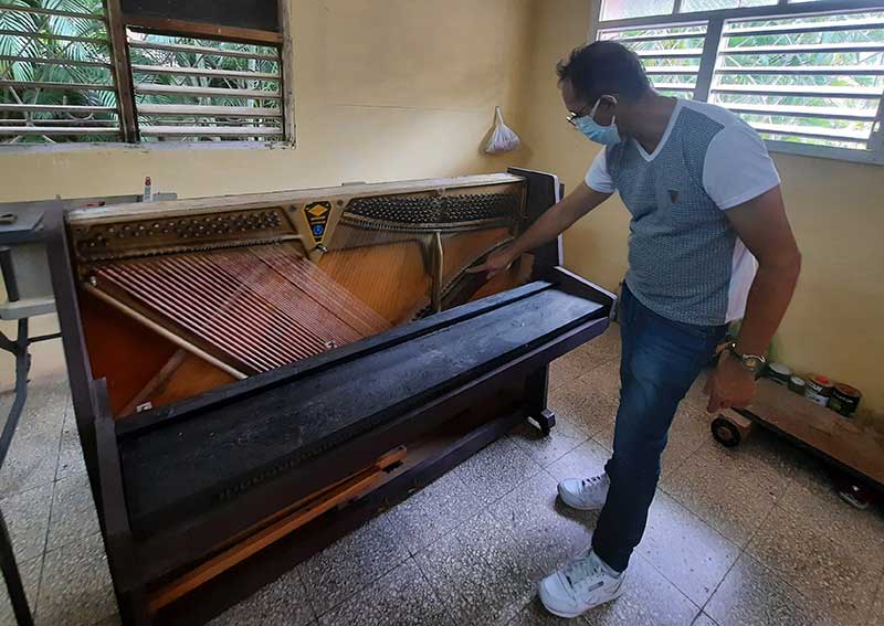 jorge luis piano restaurador 05